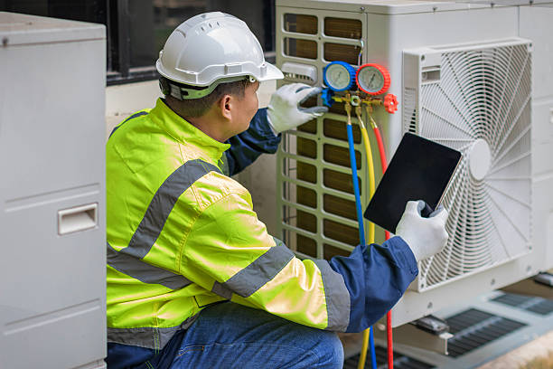 Professional Air Duct Cleaning technician working in Glenwood, NC